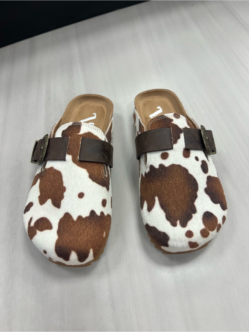 Very G Brown and White Cowhide Slip-On Clogs with Adjustable Buckle